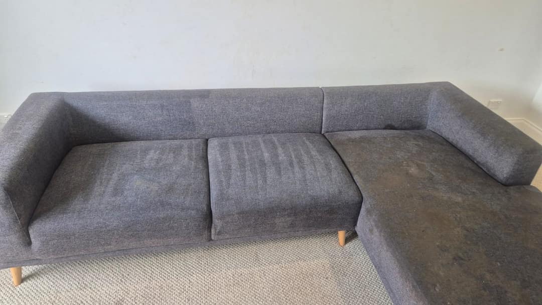 After - grey fabric corner lounge after Ultraclean cleaning